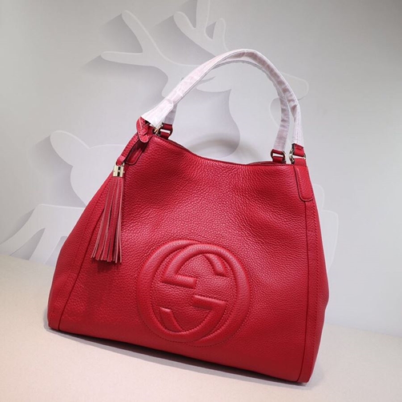 G*u*i top handle bags